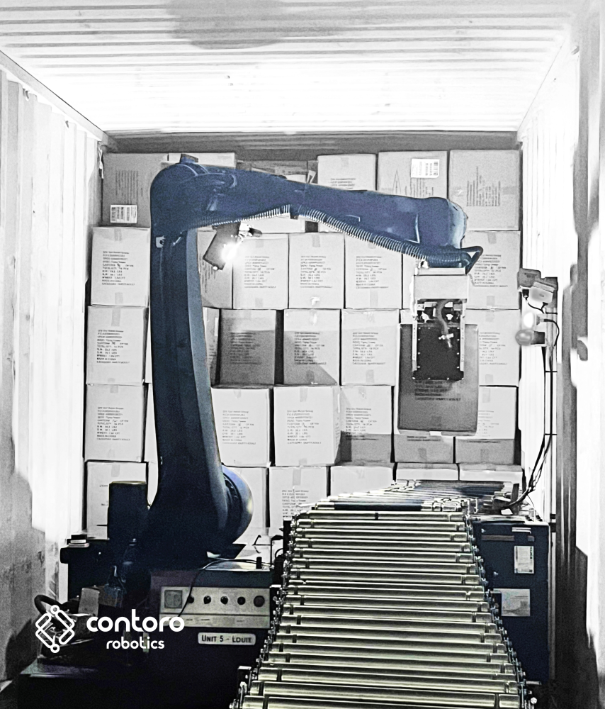 robotic arm with boxes on wall